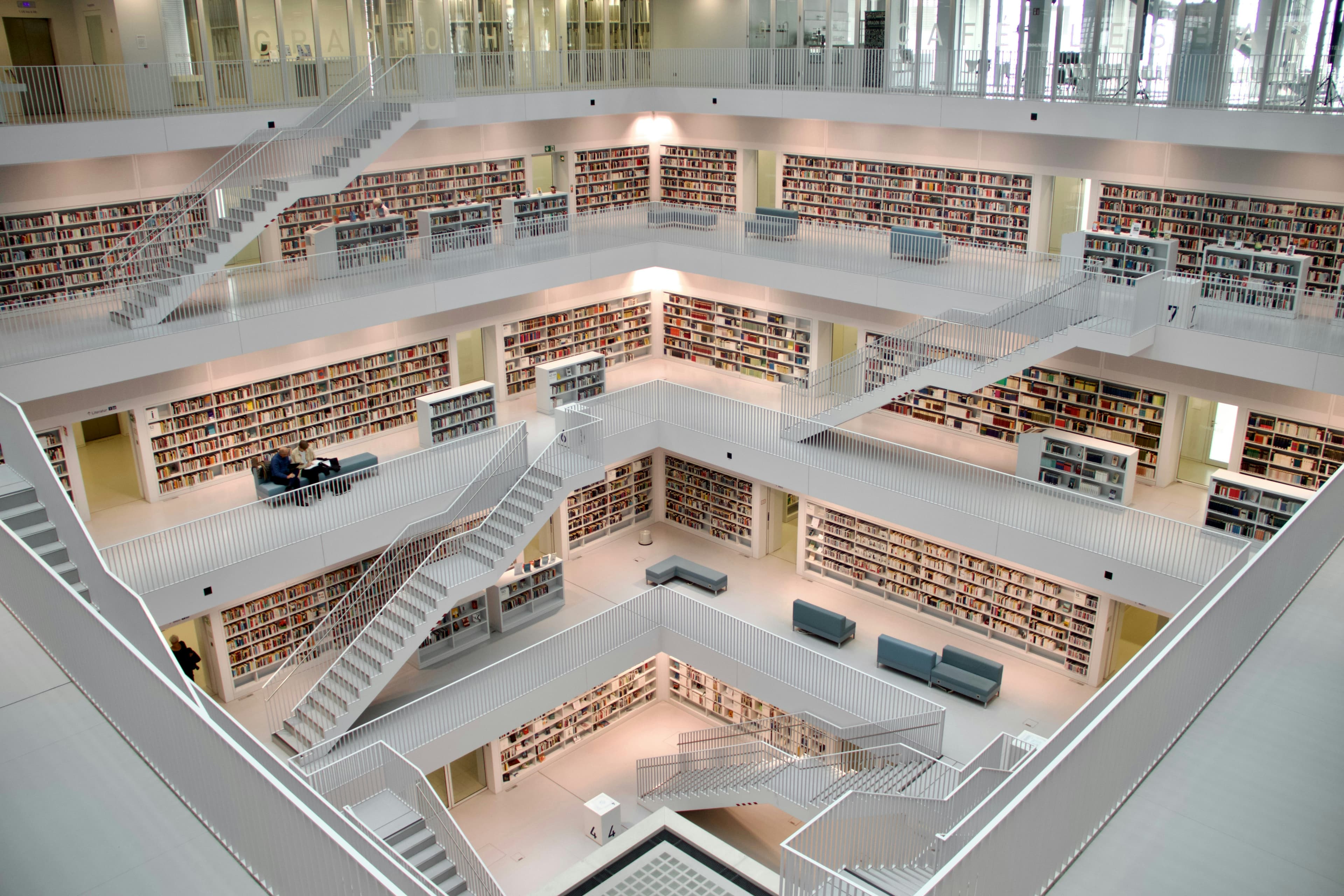 Modern Multi-Level Library Interior with Bookshelves in Stuttgart, Germany